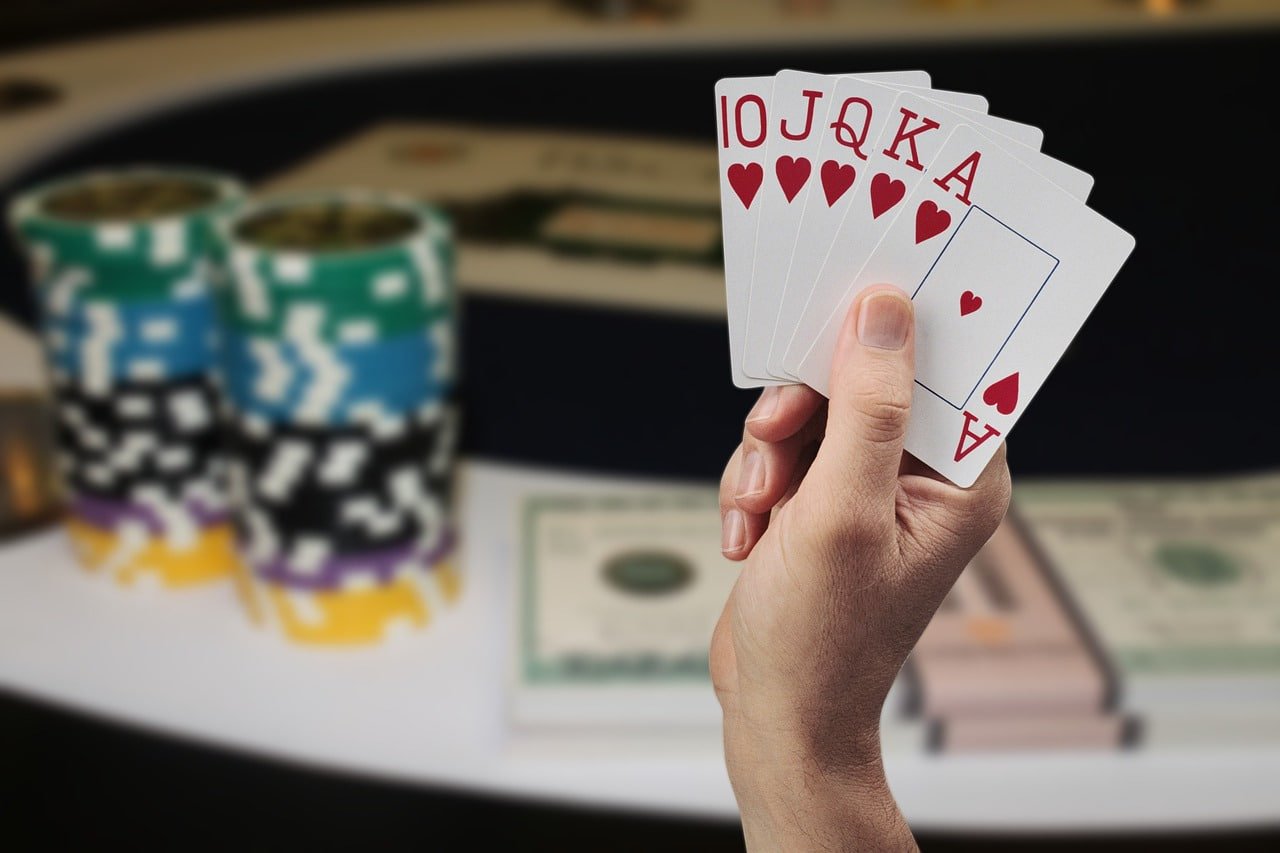 Filipino user browsing jlmaam sports and casino platform on smartphone